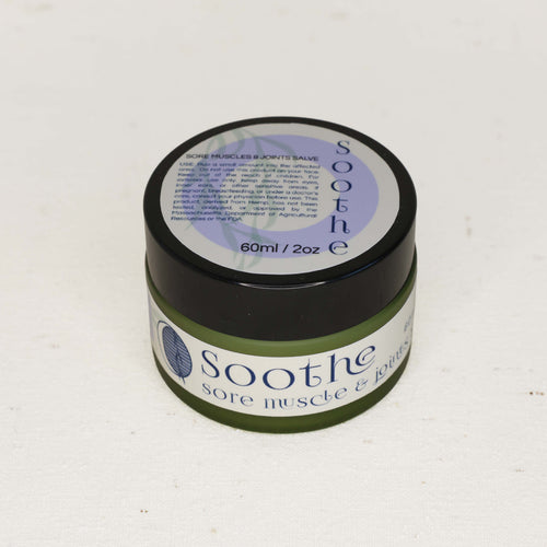 Jar of 'Soothe' cream on a white background